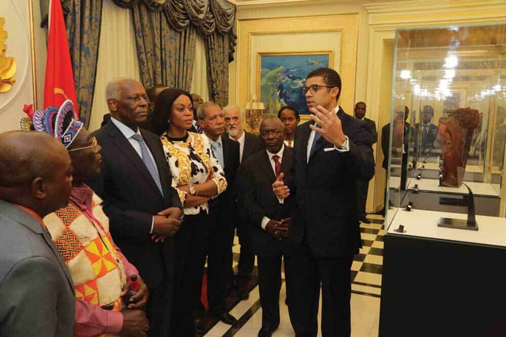 This is an image during the official Ceremony in Luanda where 3 stolen pieces from Dundo Museum have been officially presented to the Angolan authorities on the very symbolic date for Angola of February 4th in presence of the President of Angola, His Ex. José Eduardo Dos Santos and King of Chokwe, His Majesty King Mwene Muatxissengue Wa-Tembo. This ceremony took place in the Presidential Palace in Luanda. Image courtesy of the Sindika Dokolo Foundation.