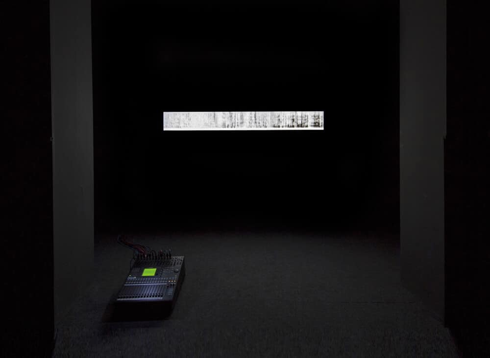 Lawrence Abu Hamdan, Saydnaya (the missing 19db), 2017. Sound, mixing desk, light box, dimensions variable. Commissioned by Sharjah Art Foundation. Courtesy of the artist Sharjah Art Foundation and Maureen Paley, London.