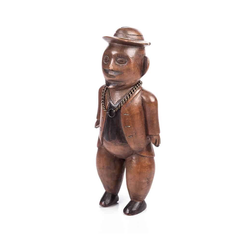 Standing male figure of a European, South East Africa, Late 19th/early 20th century. Wood, metal chain. Height: 35 cm. Courtesy of Stephan Welz & Co.