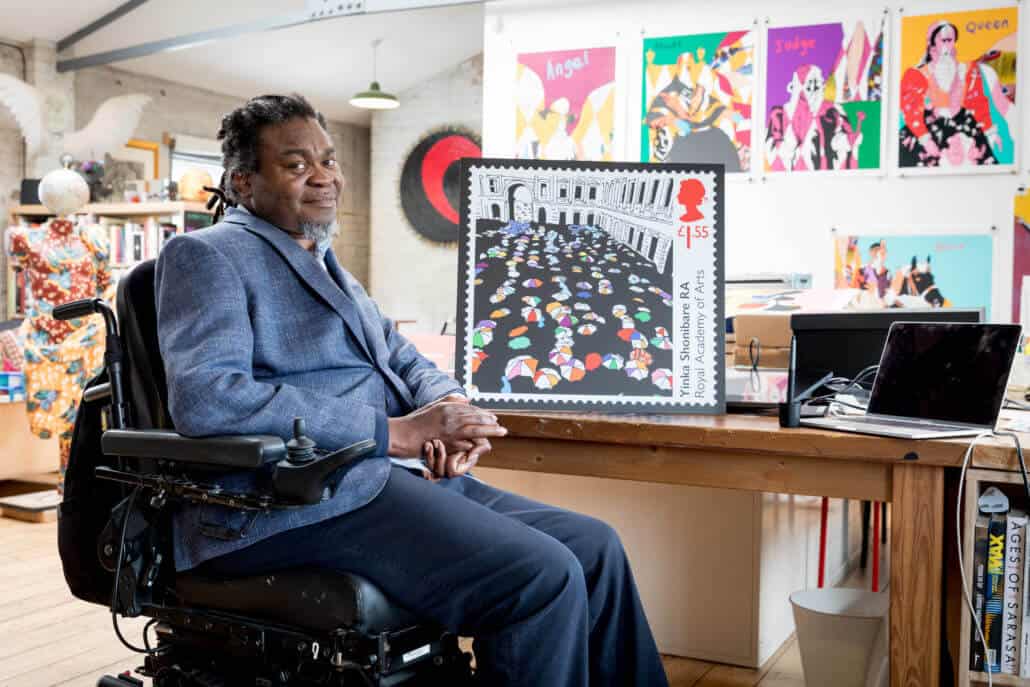 Artist Yinka Shonibare with his Royal Mail stamp at his studio in London.