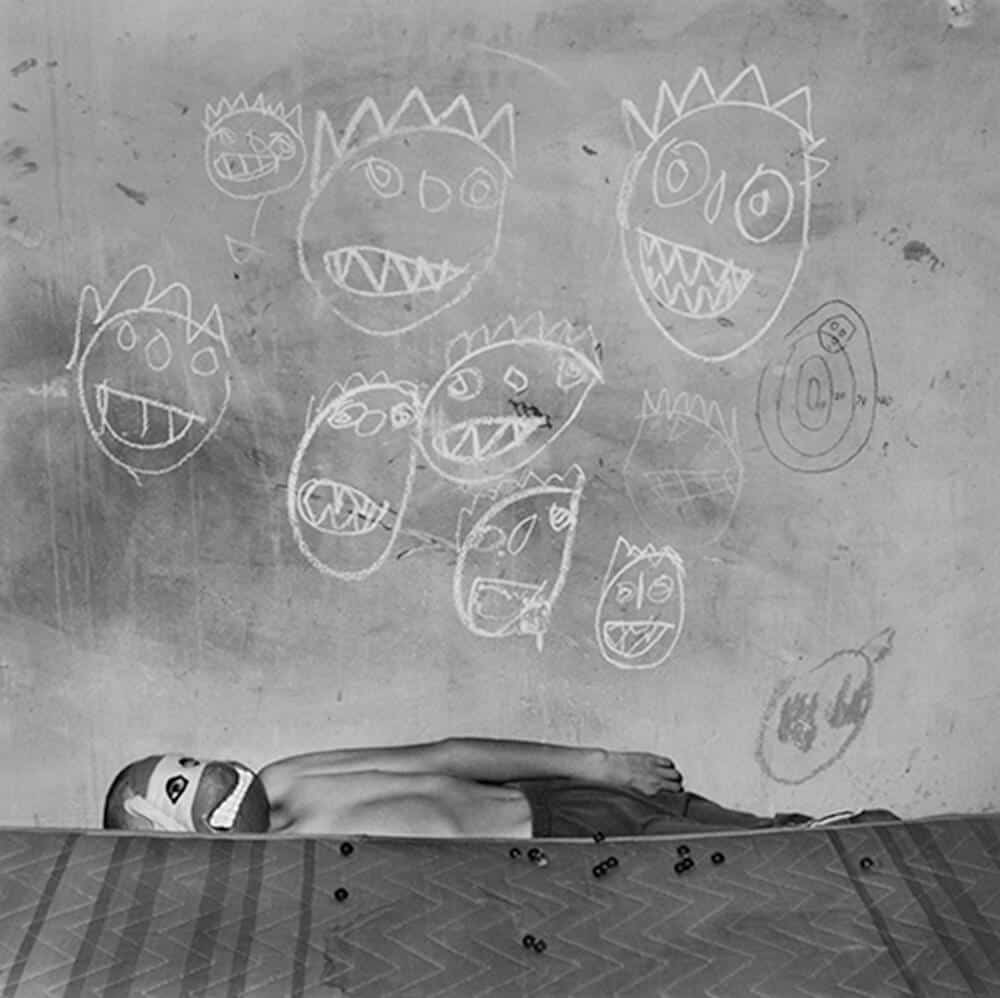 Roger Ballen image which was used for the album cover Generation Freakshow, by the band Feeder.