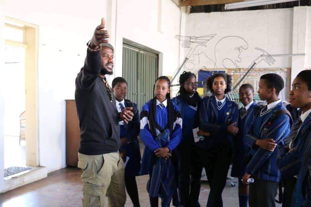 Blesing Ngobeni talking with students