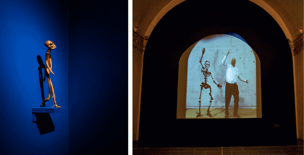 LEFT TO RIGHT: Nelson Mukhuba, Skeleton, 1985. Carved wood. Photographer: Jelil Olmedo. William Kentridge, 30% of Life (film still), 2018. Digital film with sound. Courtesy of the artist.