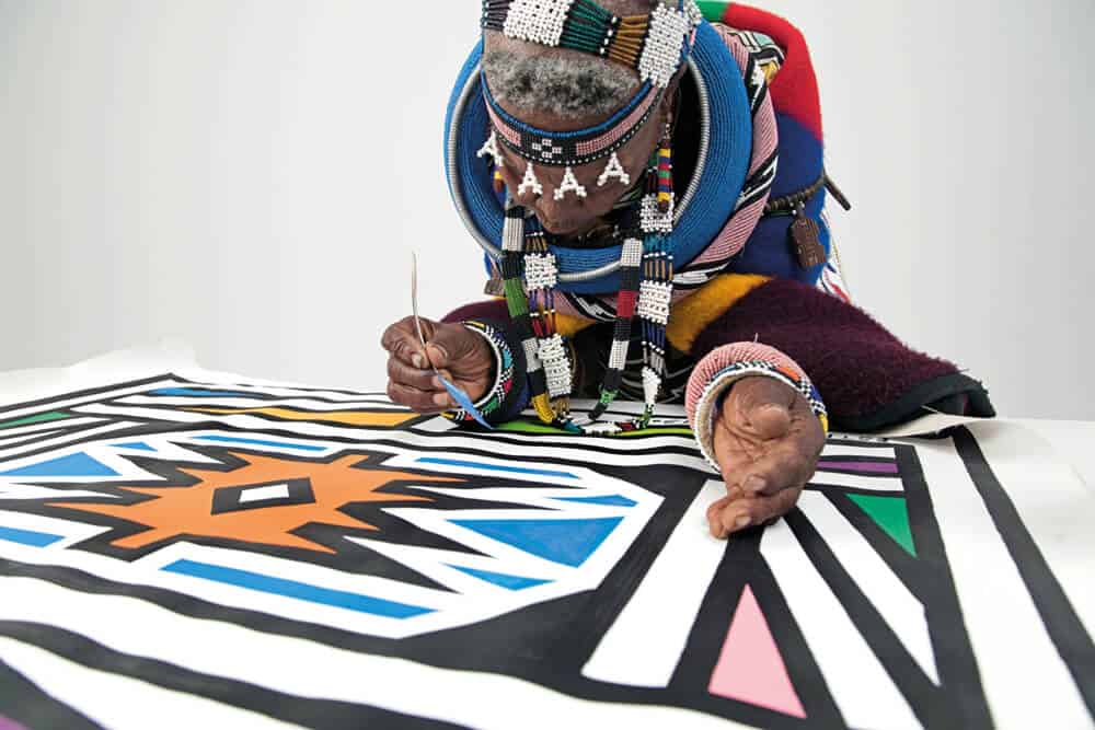 Artist and cultural icon, Dr. Esther Mahlangu photographed by Clint Strydom, 2018. Courtesy of The Melrose Gallery