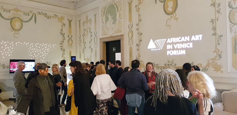 Participants & Audience waiting mingling before ‘African Art in Venice Forum’ starts. The Forum took place 7-9 May 2019 at Hotel Monaco & Grand Canal Venice, Italy. Photographer: Marcus Gora