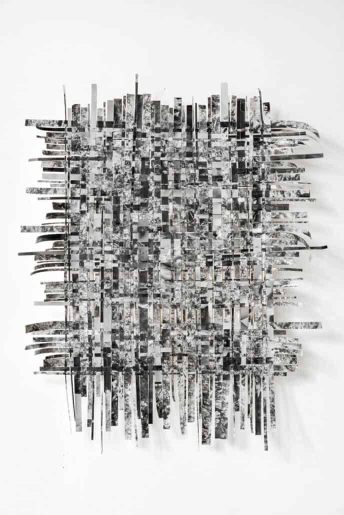 Strauss Louw, Embodied Landscape, 2019. Woven strips of silver gelatin prints, 95 x 75cm.