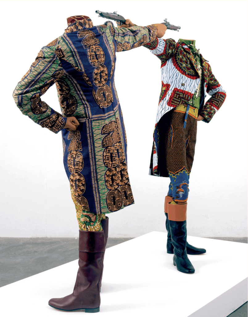 Yinka Shonibare CBE (RA), How to Blow Up Two Heads at Once, 2006. Installation, 2 mannequins, dutch wax printed cotton textile, leather riding boots, plinth, 175 x 245 x 122cm. © Yinka Shonibare, courtesy of Stephen Friedman Fine Art